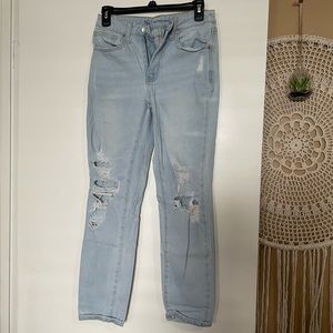 Light wash ripped jeans size 3 slight mom jean fit.
